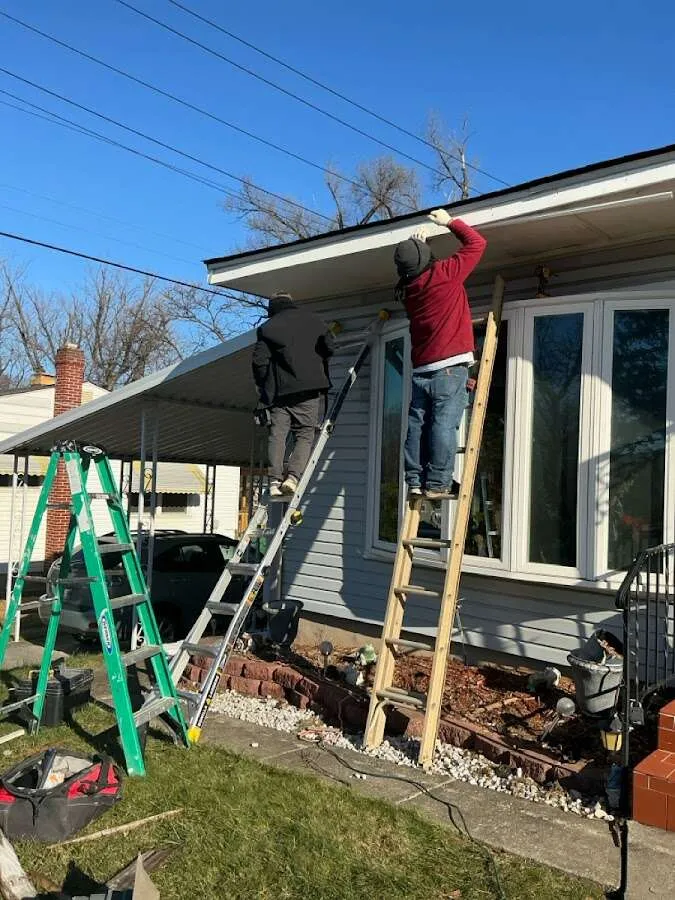 Restoration crew performing exterior repair in Finneytown